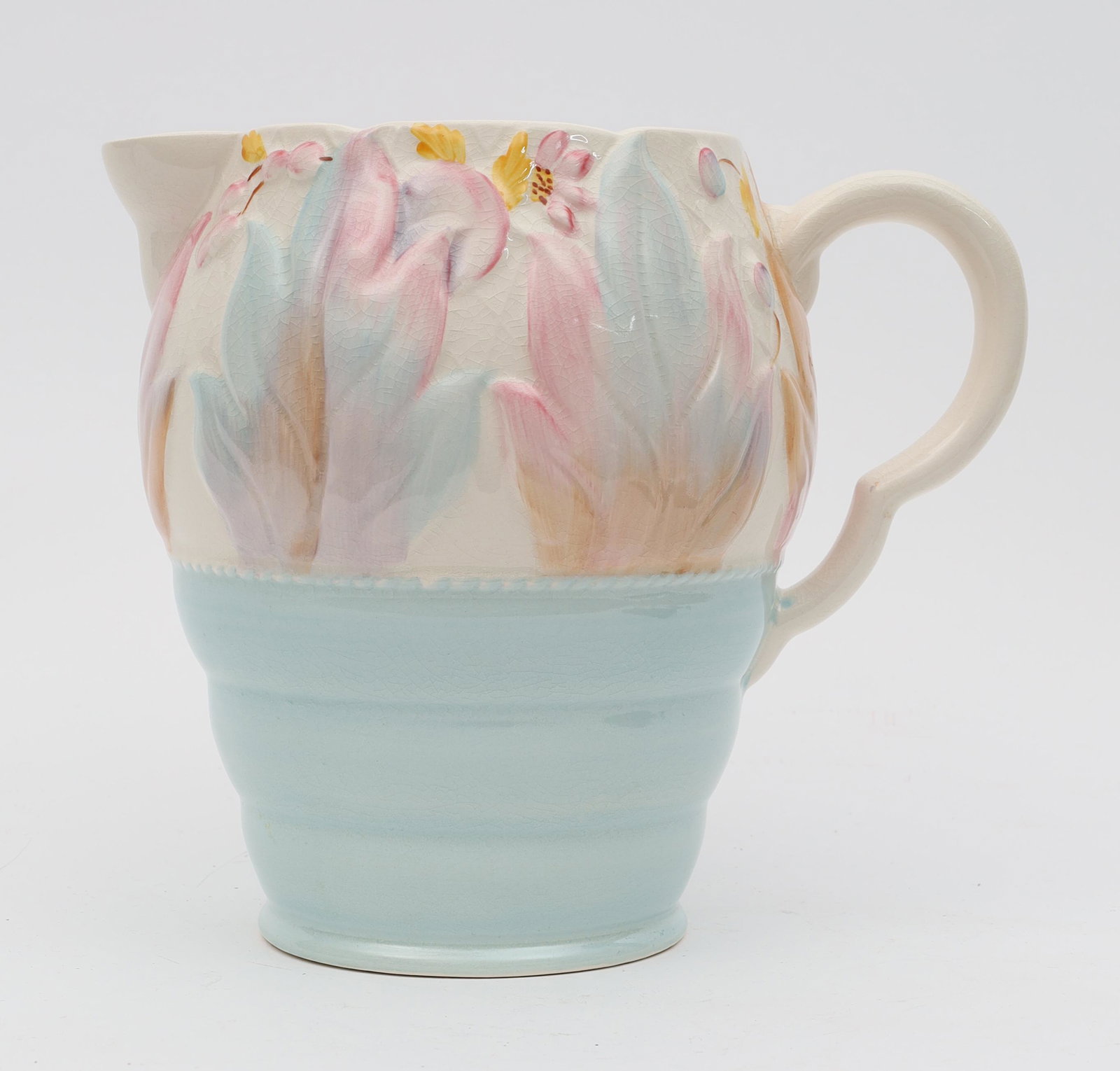 C. 1930s Clarice Cliff Leaf And Berry Pitcher: C. 1930s Clarice Cliff Leaf And Berry Pitcher. 7.75 Inches H X 9 W Including Spout And Handle.