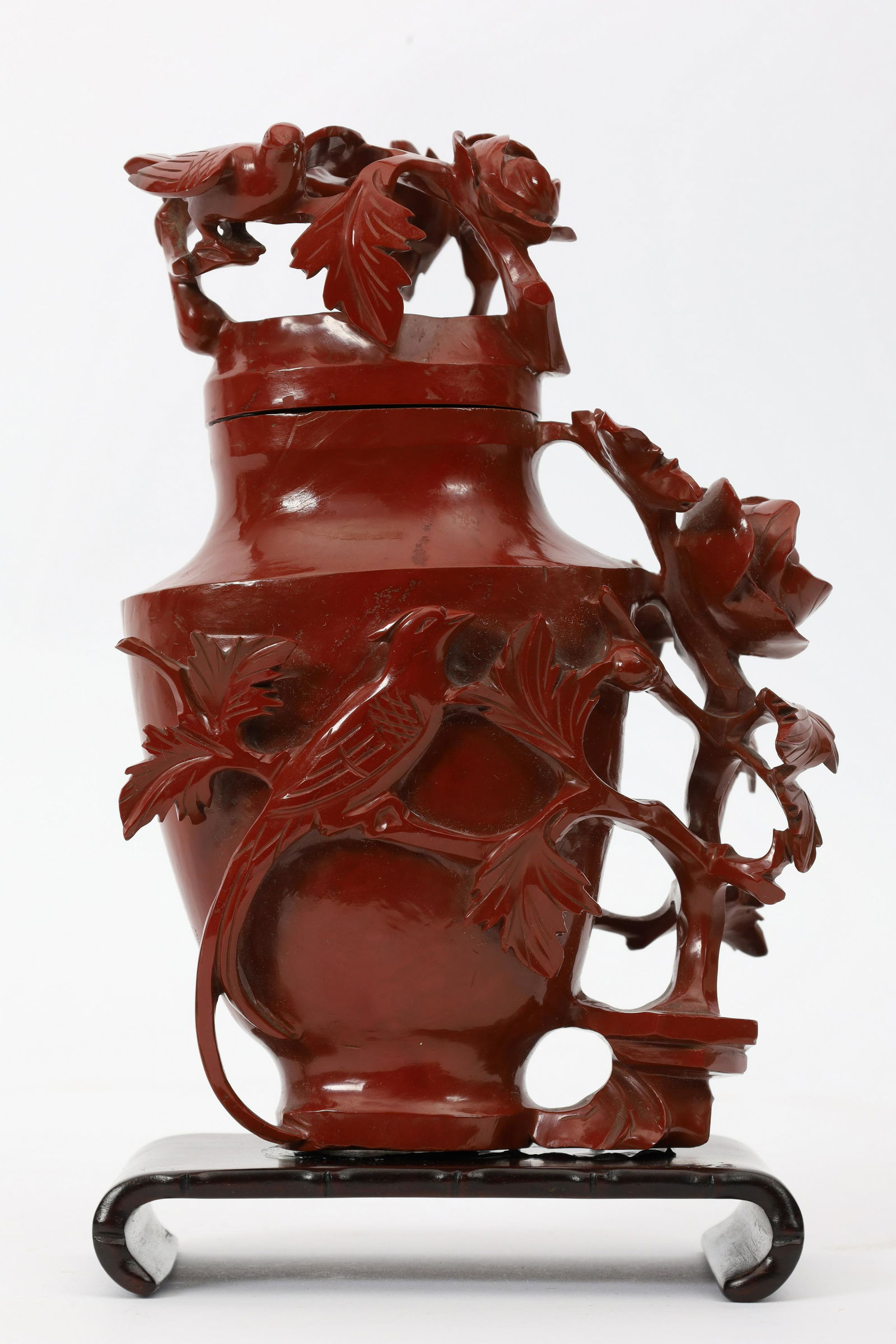 Hand Carved Chinese Red Jasper Vase: Hand Carved Chinese Red Jasper Vase With Lid / Urn. 6 inches H x 4.5 W excluding wooden base.