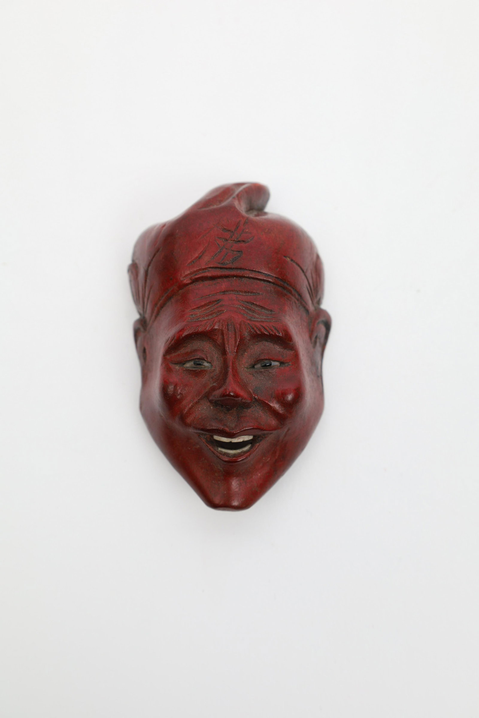 Chinese Rosewood Carved Miniature Mask Wise Man: Chinese Rosewood Carved Miniature Mask Wise Man with inlaid eyes and teeth. 3 x 2 inches.