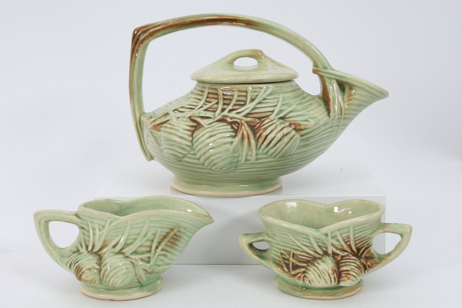Vintage 1940s McCoy Pottery Pine Cone Tea Set: Vintage 1940s McCoy Pottery Pine Cone Tea Set. Creamer, sugar and tea pot in perfect condition. Teapot measures 10 x 6.5 inches H.