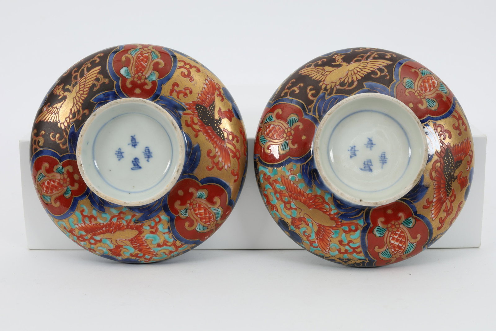Pair Signed Antique Japanese Imari Footed Bowls: Pair Signed Antique Japanese Imari Footed Bowls / Dishes. Measure 4.75 inches diameter.