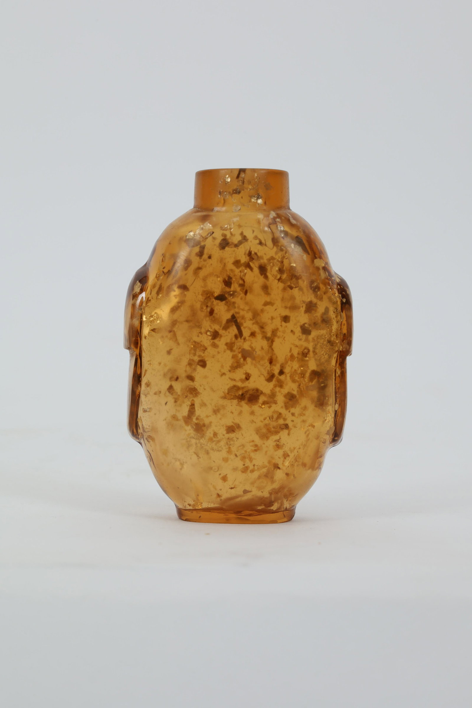 Chinese Amber Glass Gold Flecked Snuff Bottle: Chinese Amber Glass Gold Flecked Snuff Bottle. 2.75 inches H.