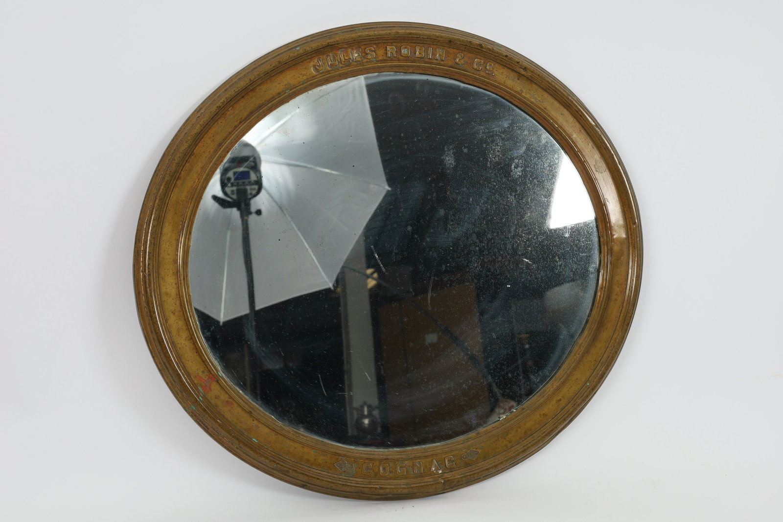 Antique Brass Mirror Jules Robin and Co Cognac: Antique Brass Oval Mirror Advertising Jules Robin and Co Cognac C. 1900-1910. 18.5 inches H x 20.5 W.