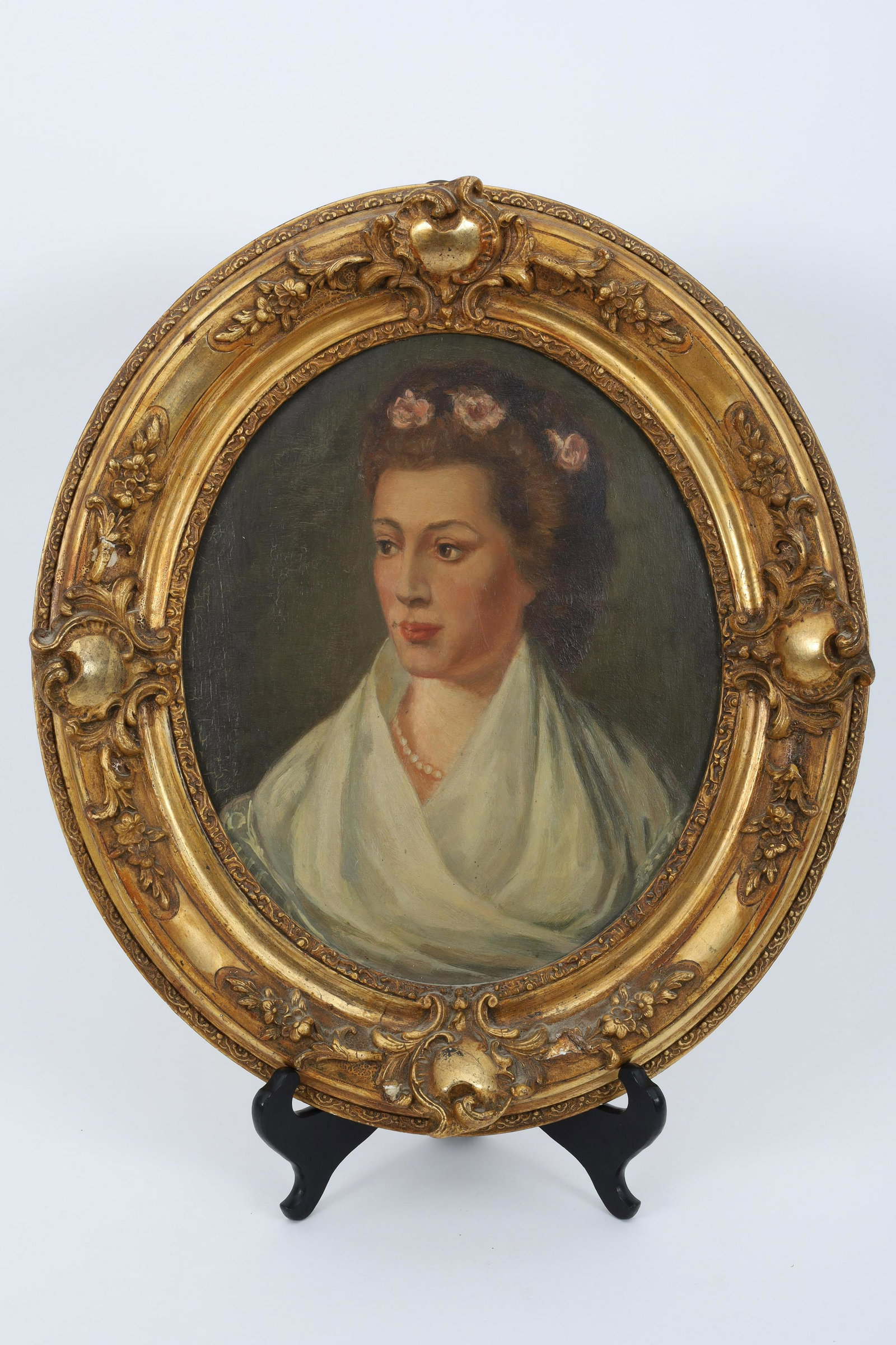 Antique Signed Rococo Portrait of a Lady: Antique Signed Rococo Portrait of a Lady, in Oval Gilt Wood Frame. Signed on verso. Board measures 12 H x 10 inches W, frame measures 18 inches H x 15 W.
