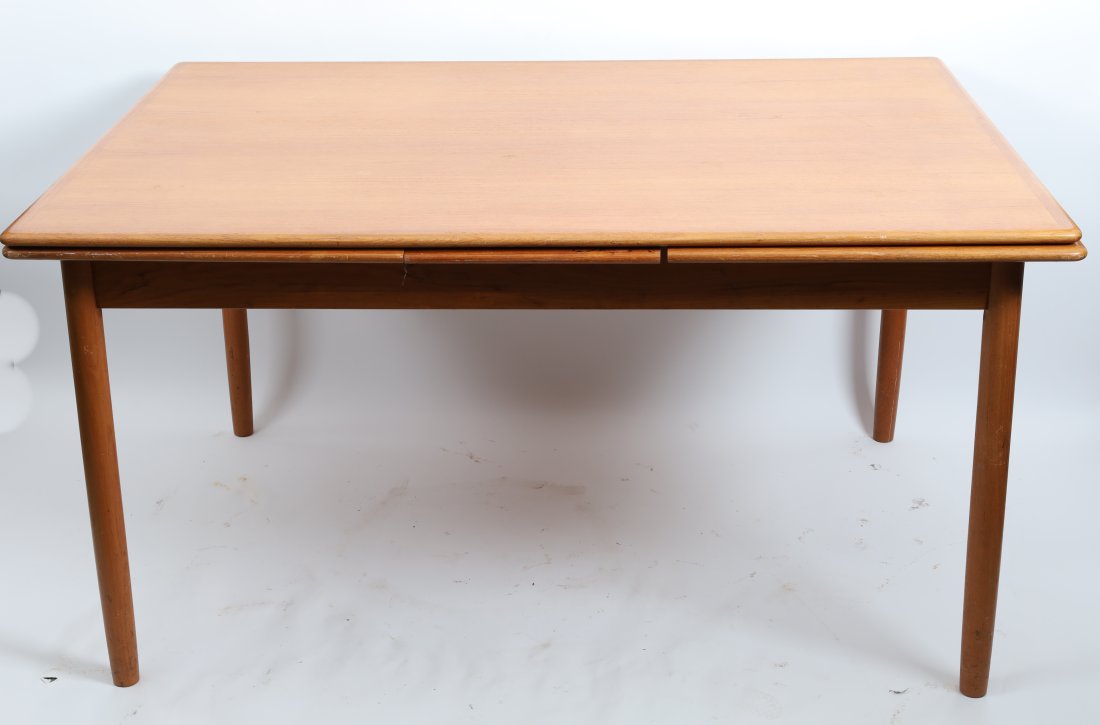Mid Century Modern Teak Extending Dining Table: Mid Century Modern Teak Extending Dining Table. 39 W x 54 L x 29 inches H, 97 inches L fully extended.