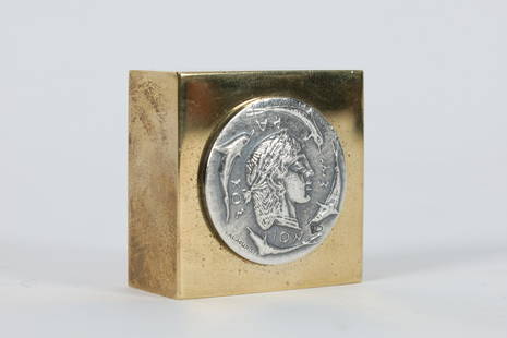 Ilias Lalaounis Bronze Sterling Greek Paperweight: Heavy square paperweight of a solid polished bronze base, inset on top with sterling silver coin depicting the profile of an ancient Greek surrounded by swimming fish, marked Lalaounis and 925. 1.5 x