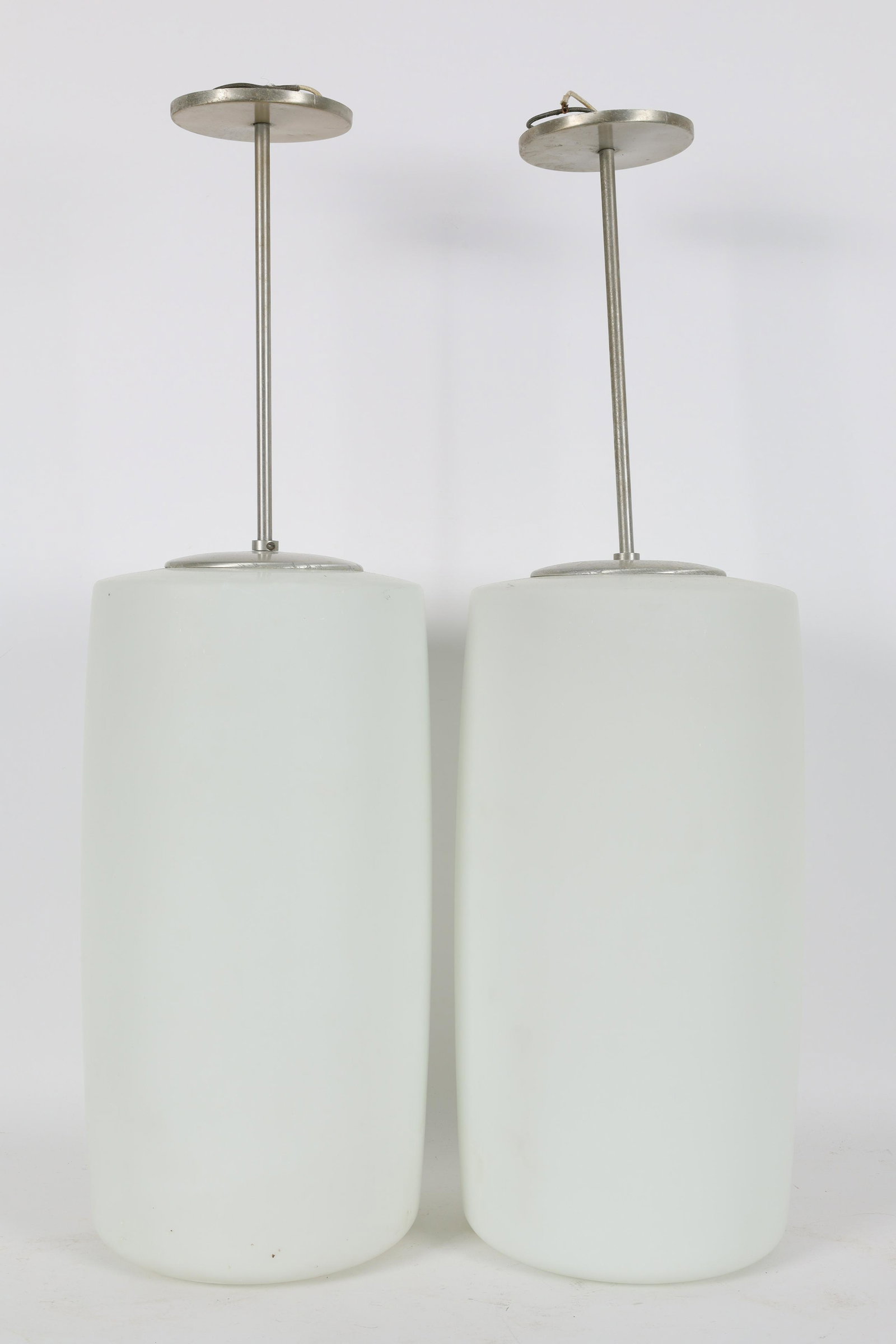 Pair Large Mid-Century Modern Glass Pendant Lamps: Pair Large Mid-Century Modern Glass Pendant Lamps. 28.5 inches H x 8.75 diameter, globes measure 17 inches H.