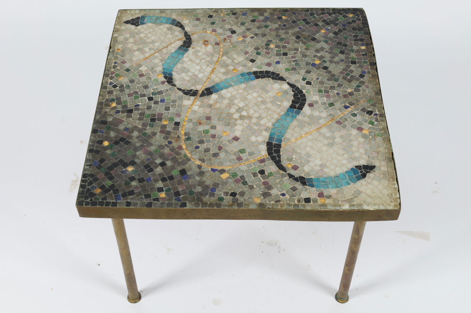 Signed MCM Atomic Genaro Alvarez Tile Table Mexico: Signed Mid Century Atomic 1950s-60s Genaro Alvarez Mosaic Tile Table Mexico. 19 x 19 x 14 inches H. Signed on underside of table.