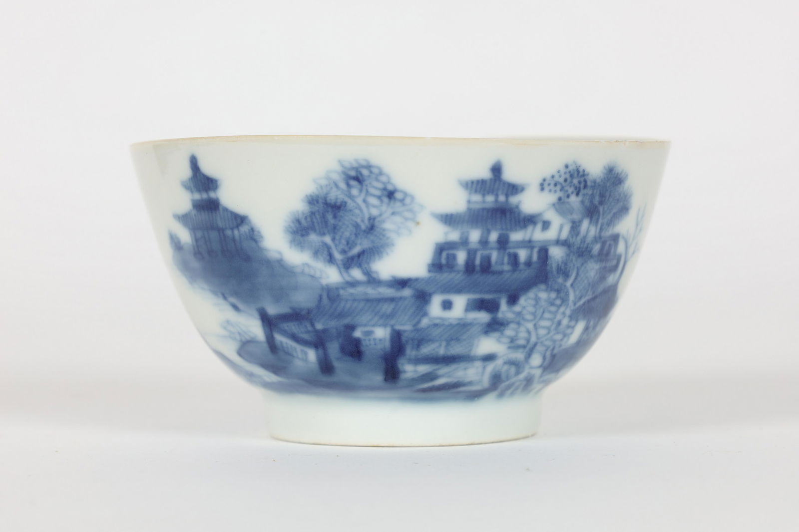 Antique Chinese Blue and White Painted Tea Cup: Antique Chinese Blue and White Painted Tea Cup. Fleabites to rim. 3.75 inches diameter x 2 H.
