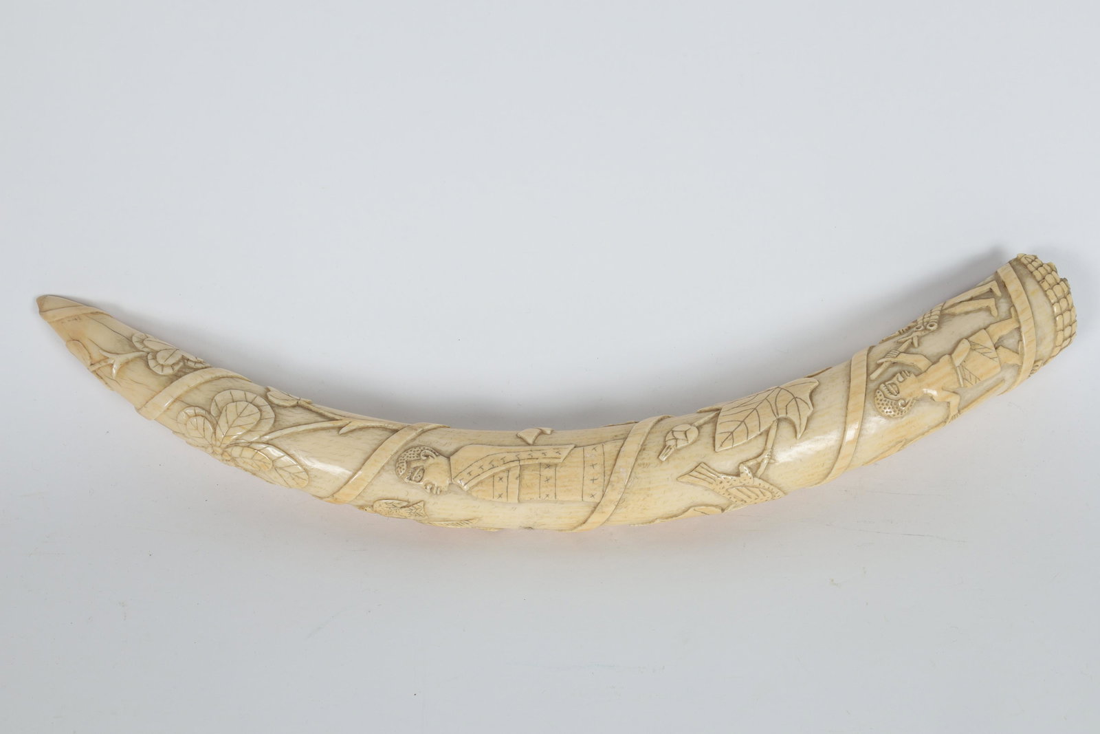 Antique African Carved Tusk Ascending Figures: Antique Tribal African Carved Tusk, Ascending Figures and Animals in spiralling register. Some loss to bottom, please see photos. This item cannot be exported from Canada. 17.5 inches L x 1.5 diameter