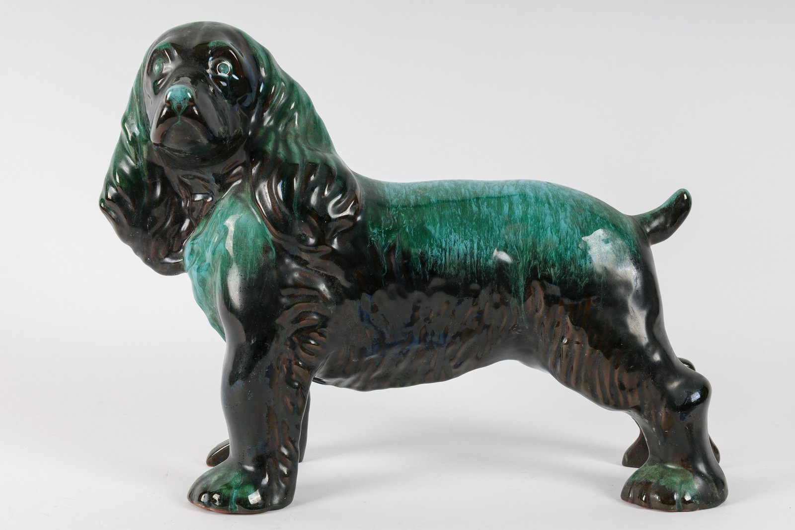 Blue Mountain Pottery Cocker Spaniel Dog BMP: Blue Mountain Pottery Cocker Spaniel Dog BMP. Measures 12 inches L x 11 H x 5 W. Small chip to rear foot. Please see photos.