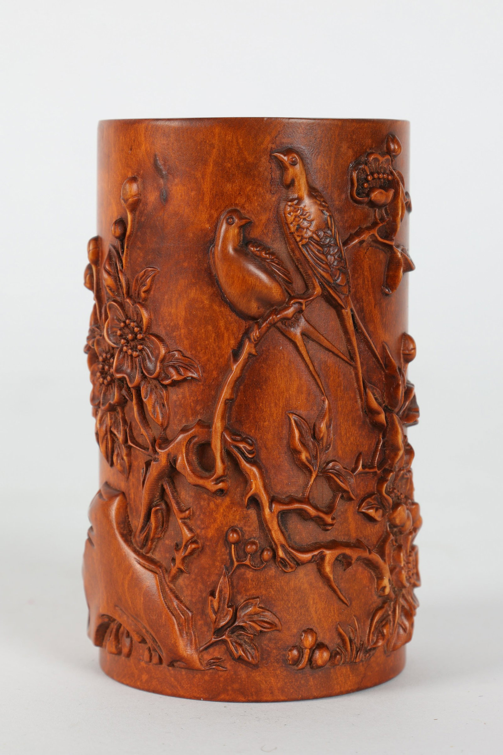 Chinese Carved Boxwood Brush Pot: Chinese Carved Boxwood Brush Pot decorated with birds and flowering branches. Measures 4 inches H x 2.25 diameter.