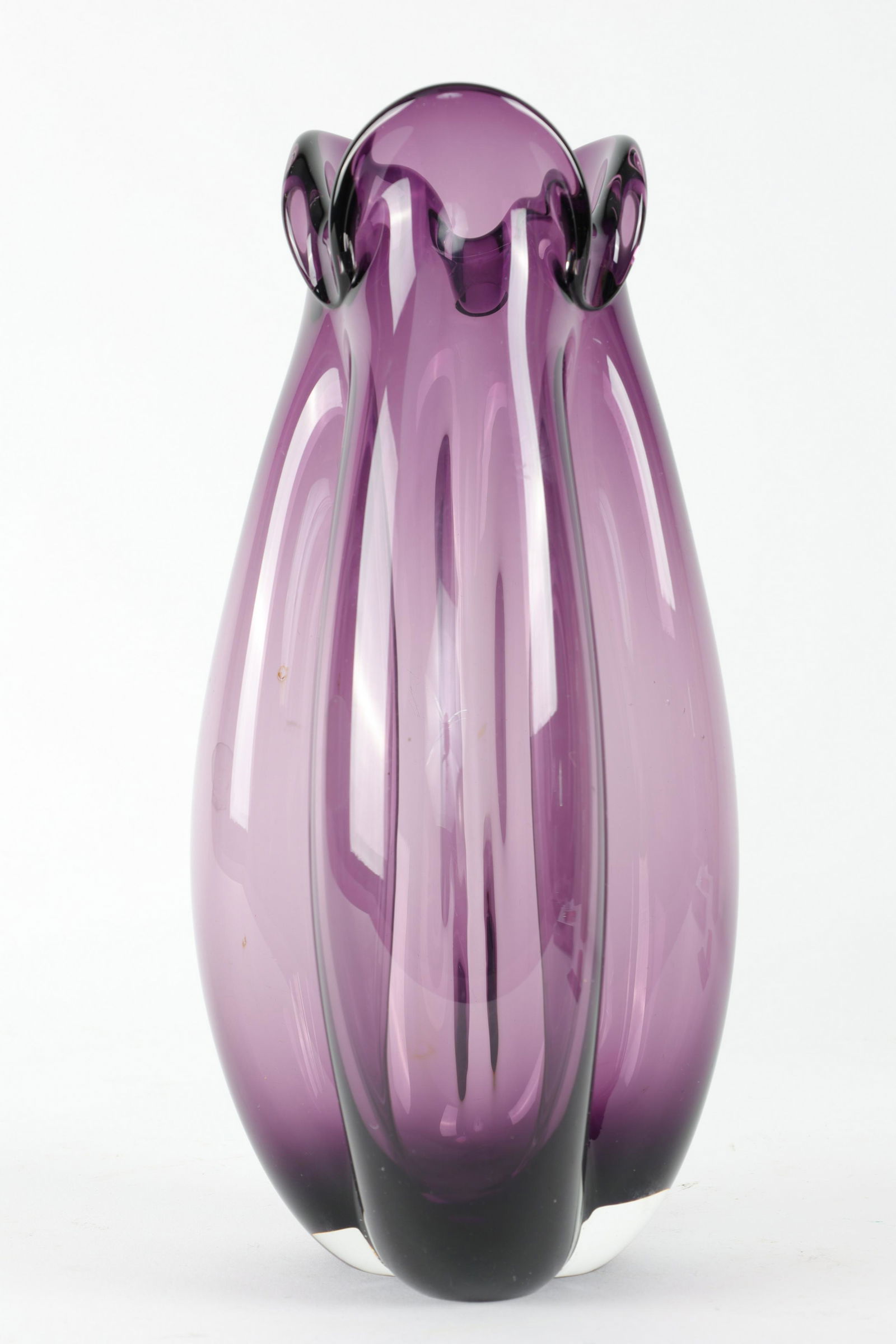 Holmegaard Treflojet Amethyst Glass Vase Lutken: 1955 Holmegaard Treflojet Amethyst Glass Vase by Per Lutken. Signed on base. Measures 10 inches H x 5 W.
