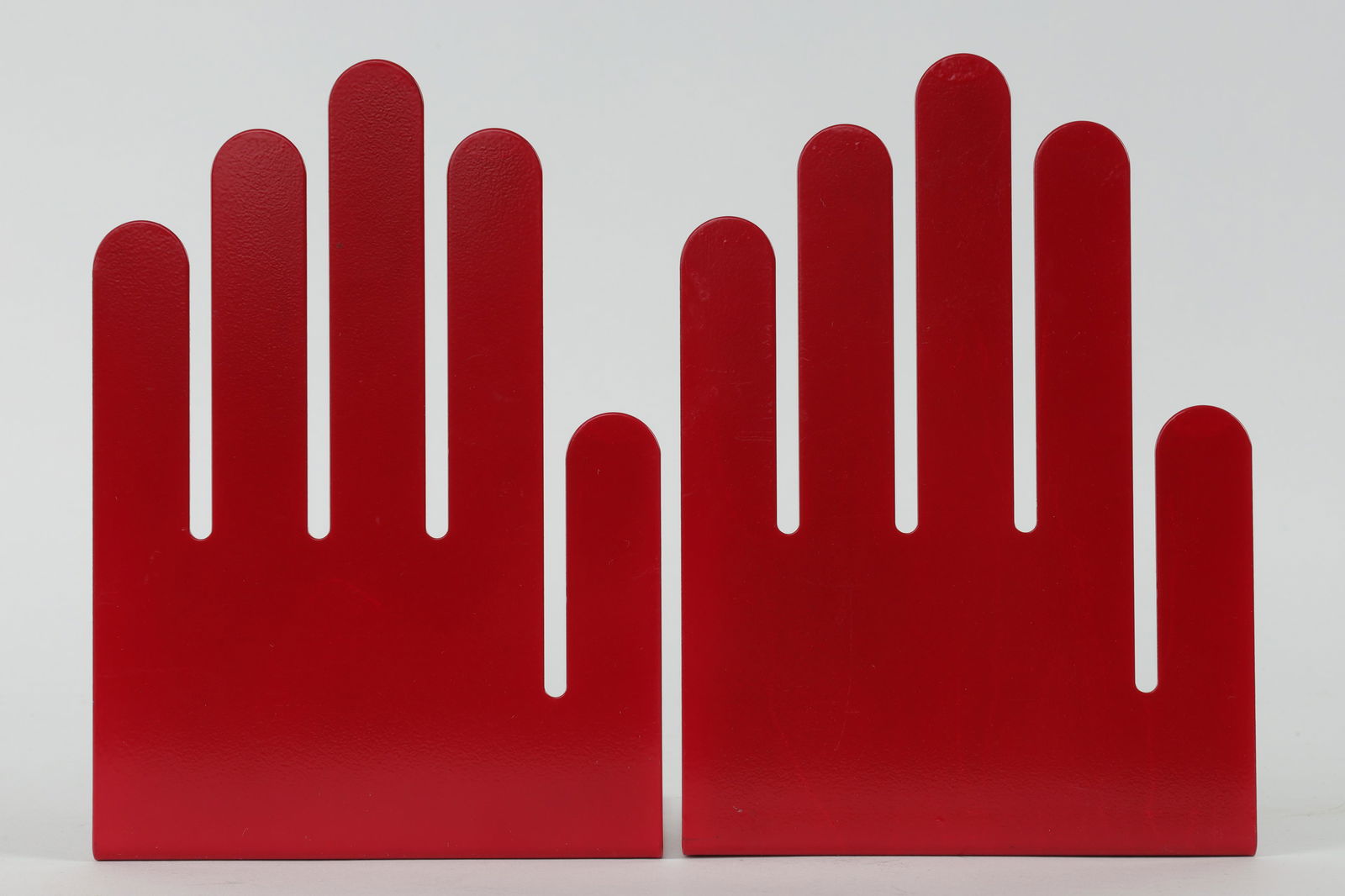 Spectrum Designs Pop Art Hand Shaped Bookends: Spectrum Designs Pop Art Red Hand Shaped Bookends. Measures 7 inches H x 4.5 deep x 5 W.