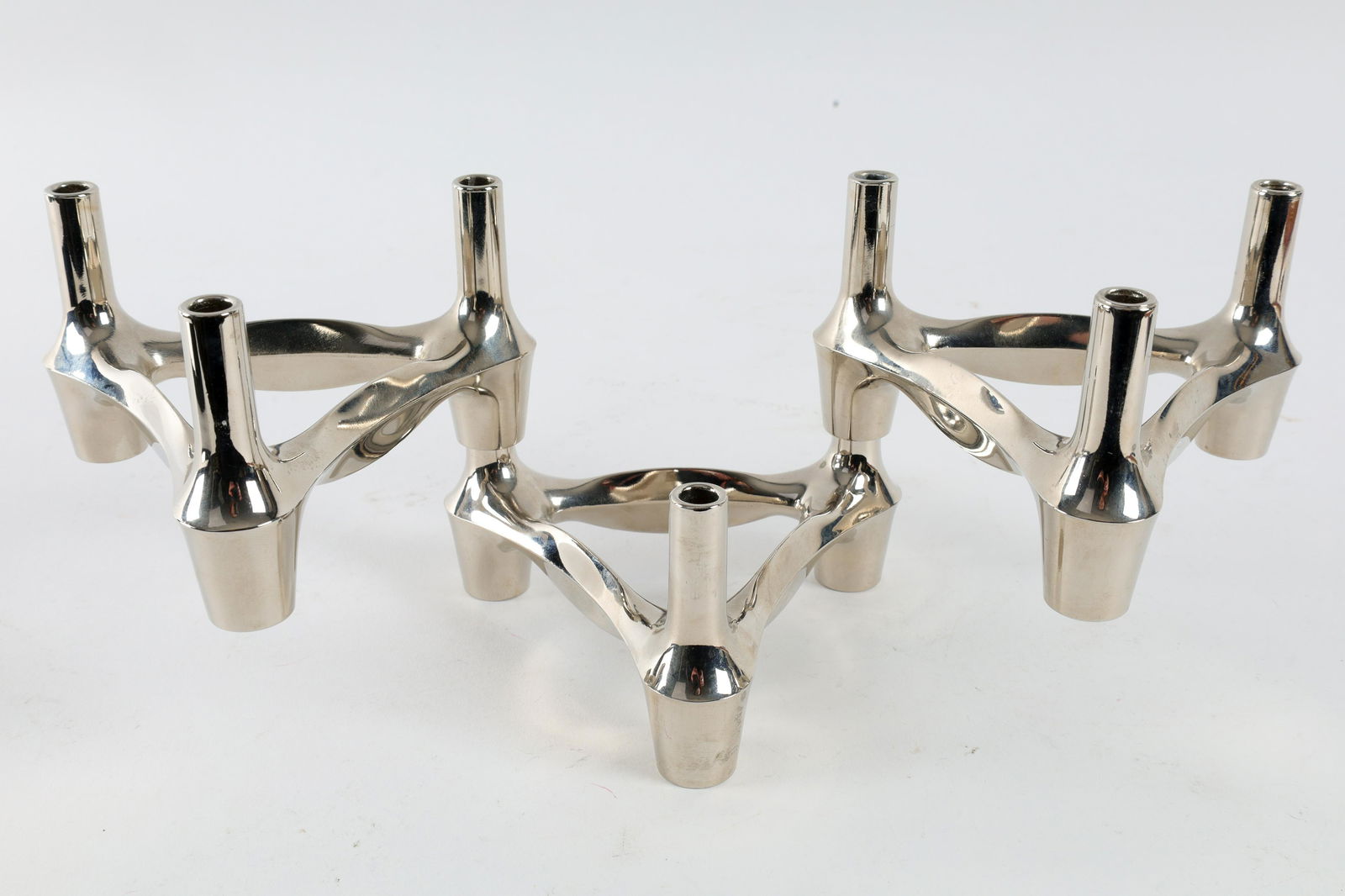 3 MCM Nagel Caesar Stoffi Stacking Candle Holders: Set of 3 Mid Century Chrome Fritz Nagel Caesar Stoffi Stacking Candle Holders. Measures 5 x 5 x 5 x 2.75 inches H each.