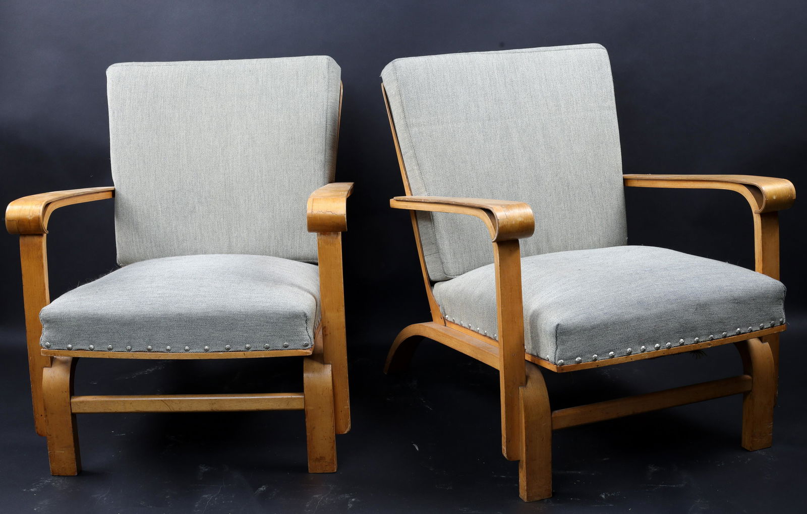 Pair 1940s Deco Mid Century Bentwood Lounge Chairs: Pair of Mid Century Art Deco Bentwood Lounge Chairs In the manner of Russel Wright. Measuring 32 inches L x 25 W x 30 H, seat height 14 inches. One armrest needs restoration, chairs have been previous