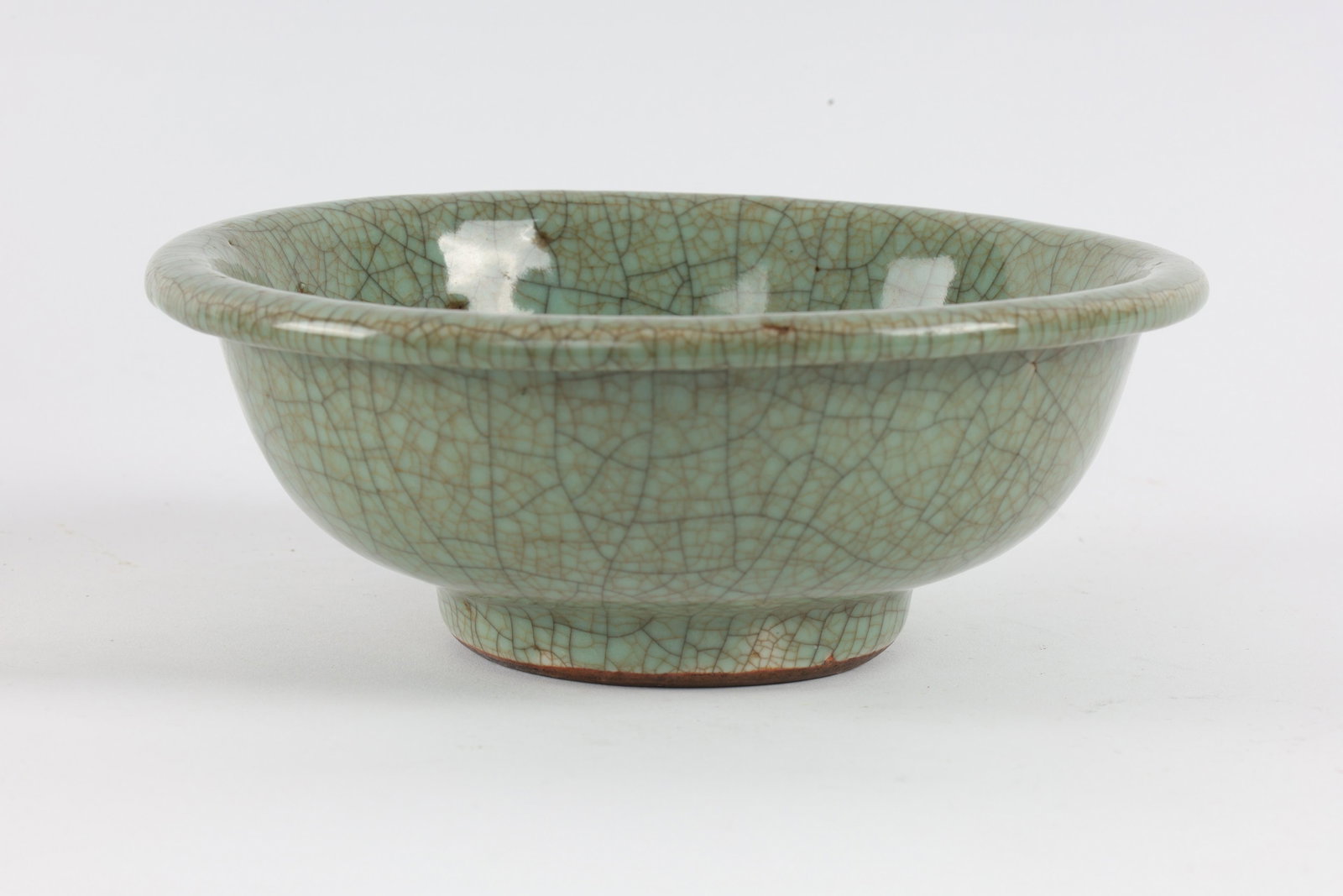 Antique Chinese or Vietnamese Crackle Glaze Bowl: Antique Chinese or Vietnamese Crackle Glaze Bowl. 7 inches diameter x 2.75 H.