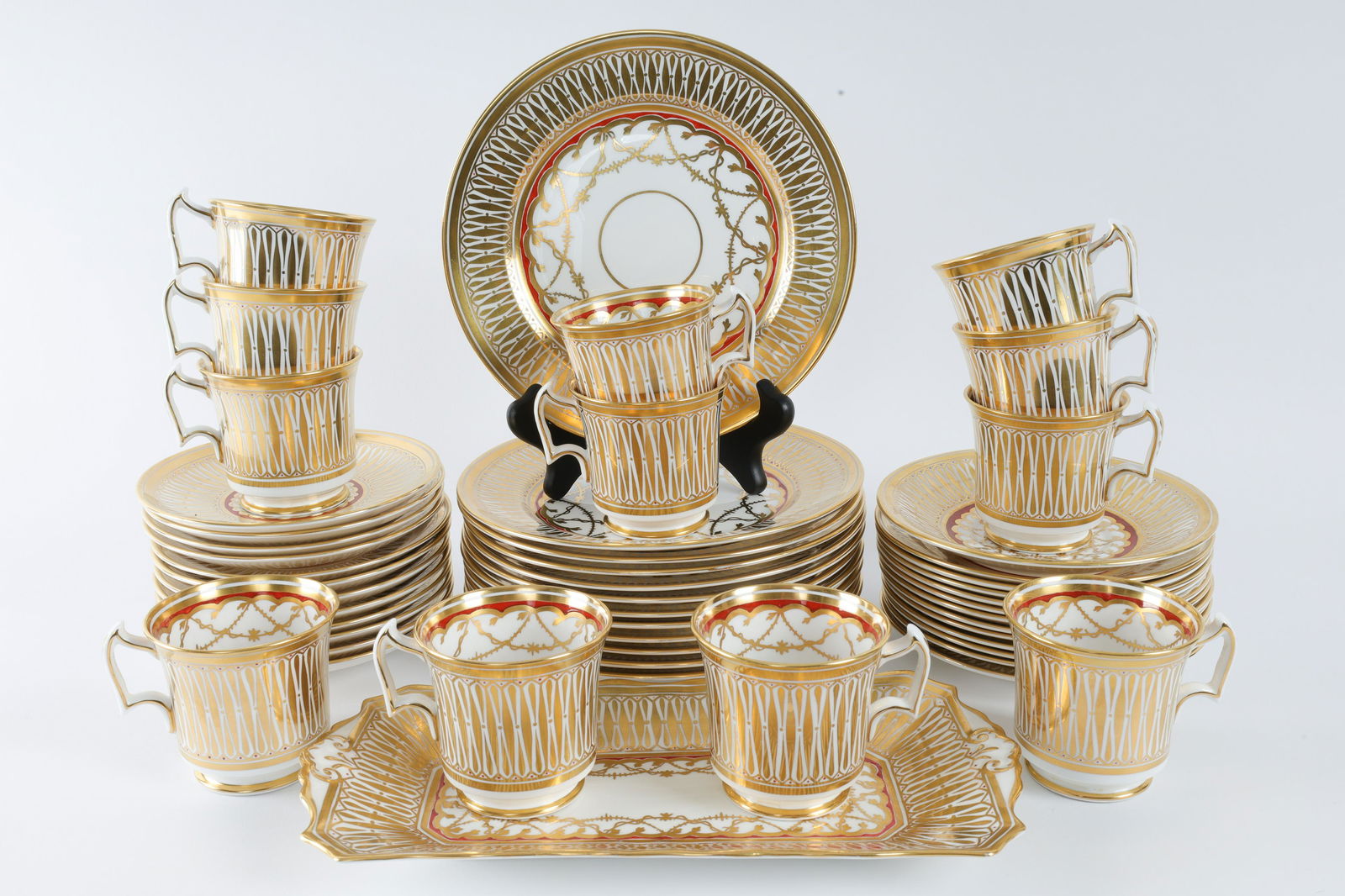 Royal Chelsea Cathedral Gilt Bone China Dishes: Royal Chelsea Cathedral Gilt Bone China Dishes for 12. 12 Luncheon plates measuring 8 inches diameter; 12 side plates (6.25 inches diameter); 12 tea cups (3.5 L x 3 inches H) and 12 saucers (5.75 inch