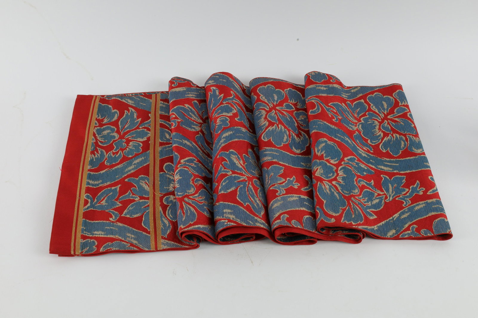 Japanese Kimono Obi / Belt: Japanese Kimono Obi / Belt Decorated with blue and gold thread embroidery flowers on silk. Some spots of wax on fabric, please see photos. Measures 160 inches L x 12 W.