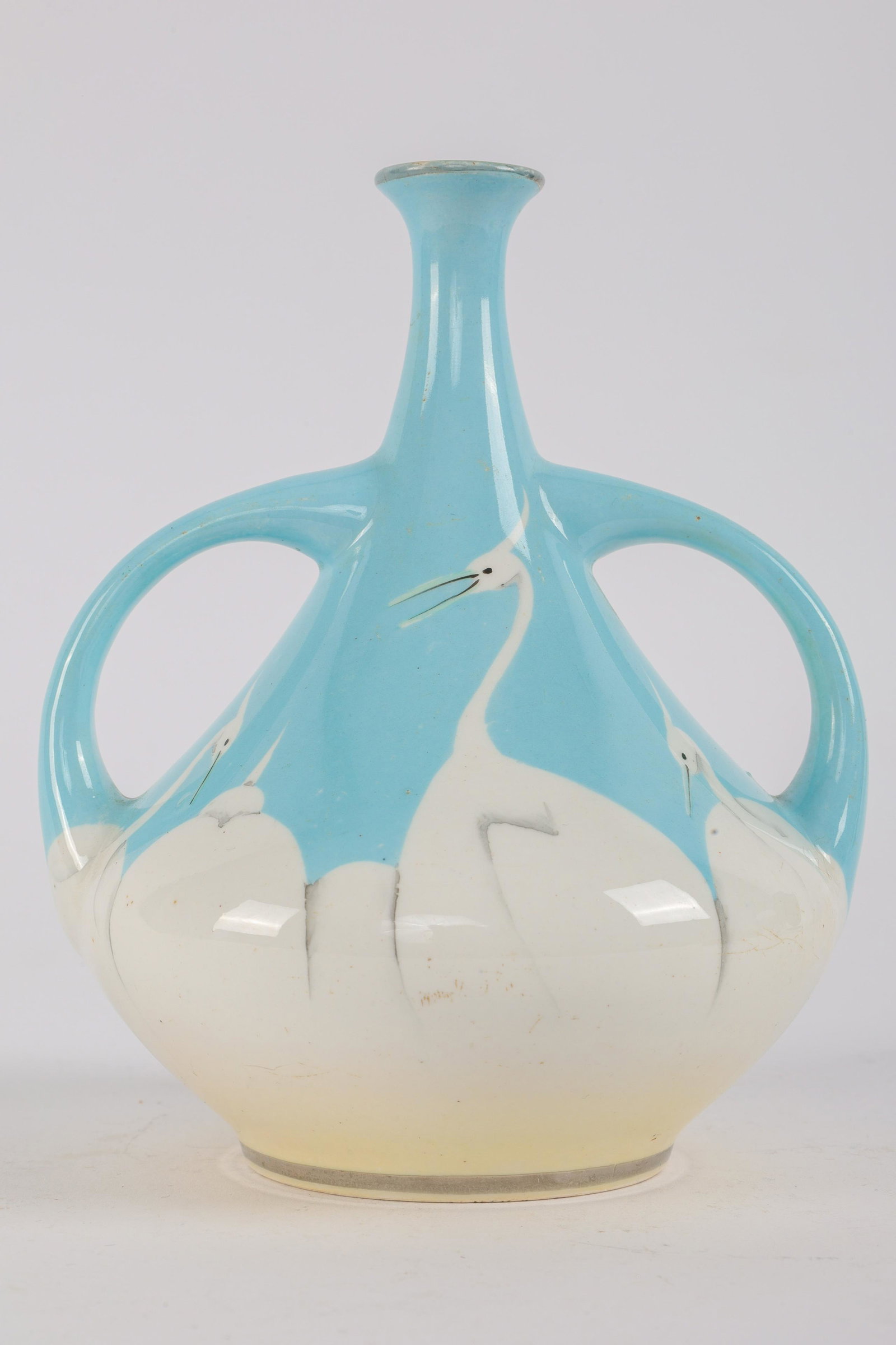 Antique Japanese Porcelain Crane Vase: Antique Japanese Double Handled Porcelain Crane Vase. Measures 6 inches H x 5 diameter.