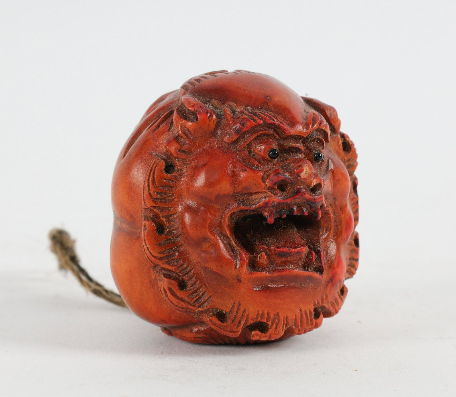 Japanese Carved Foo Dog Netsuke: Japanese Carved Round Foo Dog Netsuke. Measures 2 inches diameter.