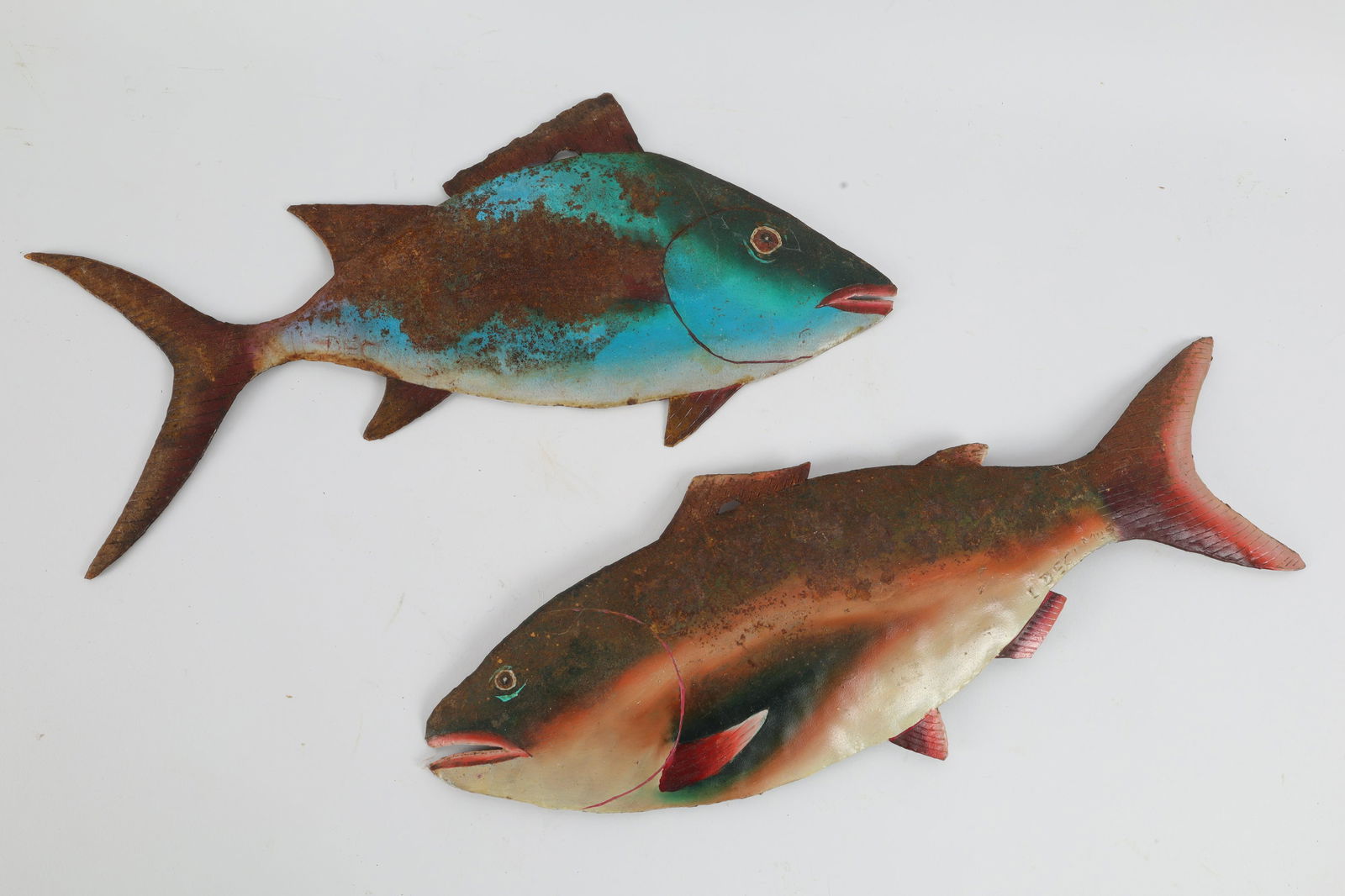 L. Decimus Signed Haitian Art Brut Steel Drum Fish: Pair of L. Decimus Signed Haitian Art Brut Steel Drum Fish. Measuring 17 inches L x 6.5 H.