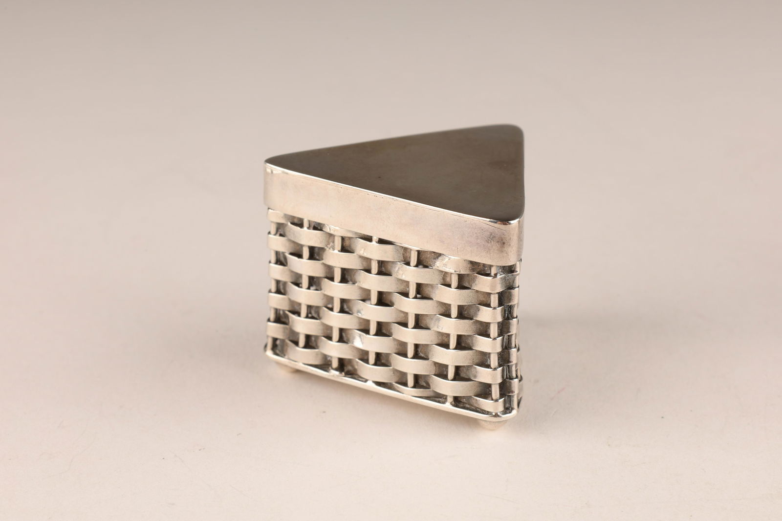 Mexican Sterling Basket Weave Triangular Pill Box: Mexican sterling silver triangular pill box with basket weave sides and ball feet. c.1950. Marked on bottom TN-210 925 MEXICO. 33.8 grams, 1.5 x 1.5 x 1.25 inches H.