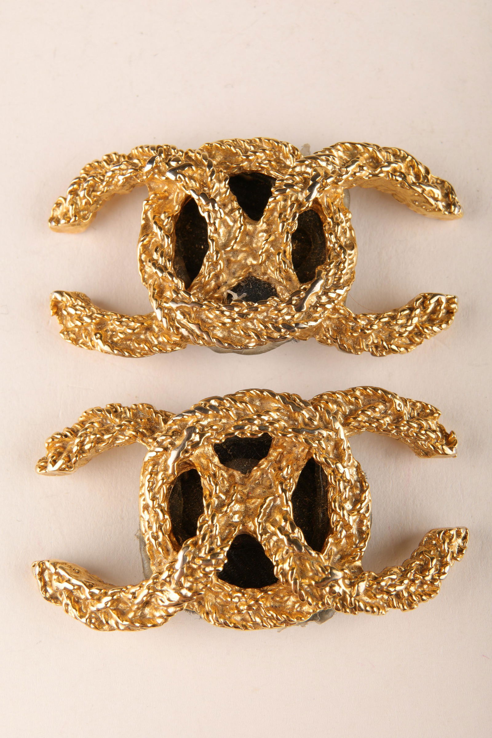 Vintage Chanel Gold Plated CC Logo Shoe Clips: Vintage Designer Chanel Gold Plated CC Logo Shoe Clips. 1 inch H x 2 W.