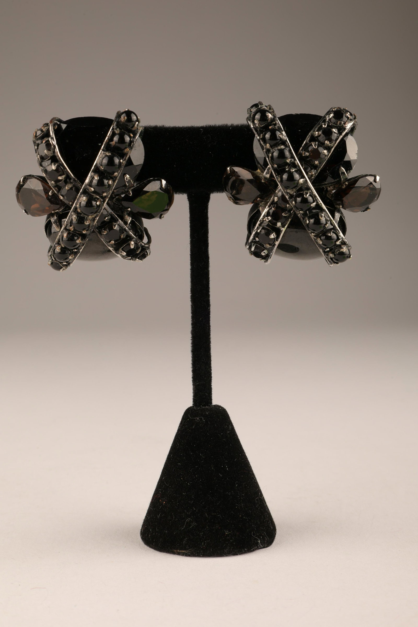 Iradj Moini Smokey Quartz and Onyx Earrings: Iradj Moini Silver Plated Brass Smokey Quartz and Onyx Clip on Earrings. Signed on back. 1.5 L x 1.25 inches W x 1 deep.