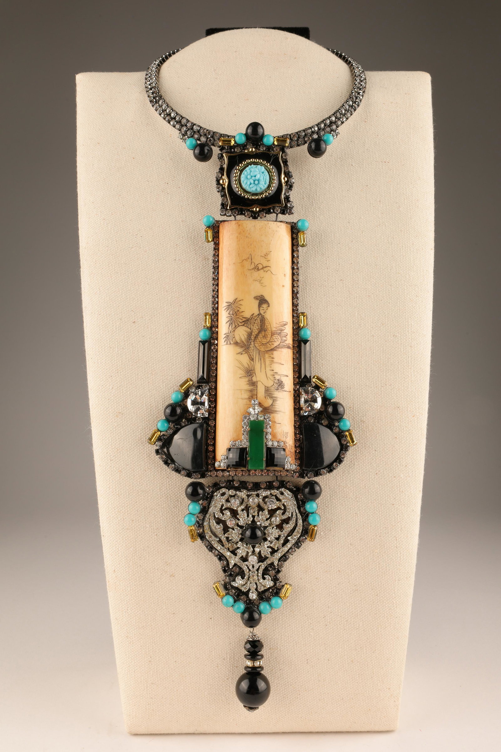 Lawrence Vrba Chinese Carved Bone Choker Necklace: Lawrence (Larry) Vrba Chinese Carved Bone Choker Necklace. Carved bone centrepiece depicting a female figure in a landscape (signed) surrounded by rhinestones, turquoise coloured round beads and bague