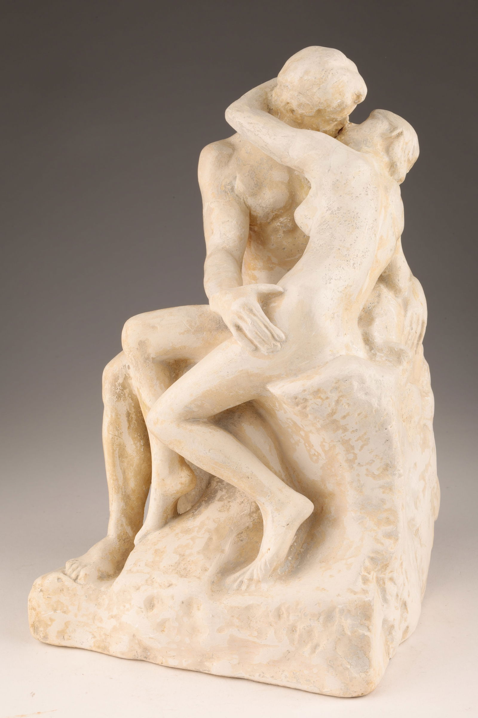 1920s Plaster Auguste Rodin The Kiss Sculpture: 1920s Plaster Rodin The Kiss Sculpture. With inset tag from maker on underside, model number on verso 2889. 10.5 inches H x 6 x 6.