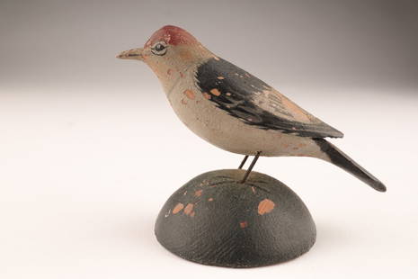 Folk Art Miniature Red Bellied Woodpecker A. Elmer Crowell: A. Elmer Crowell (America, 1862-1952) Folk Art Carved and Painted Miniature Red Bellied Woodpecker. With wire legs, perched on a domed wooden base, stamped on underside, A. E. Crowell / Maker / East H