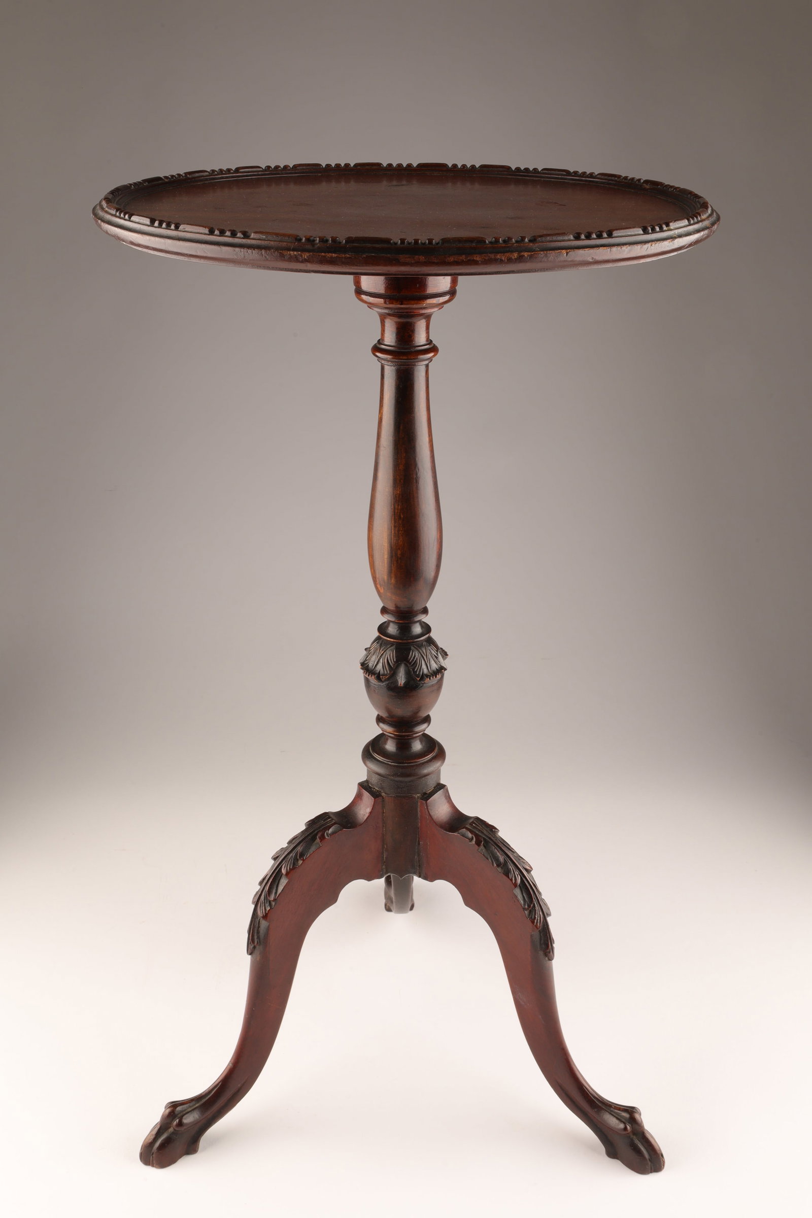 Antique English Carved Mahogany Small Tripod Table: Antique English Carved Mahogany Small Tripod Table, Wine Table / Candle Stand. Paw foot with dot and dash carved table top. 12 inches diameter x 21 H.
