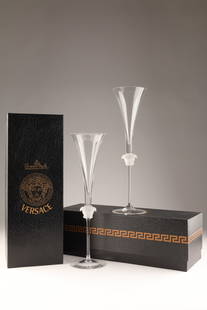 Pair Versace Medusa Lumiere Champagne Flutes: Pair Versace Medusa Lumiere Champagne Flutes. In original boxes. 12 inches H, boxes measure 13.5 L x 4.5 H x 5 inches W.