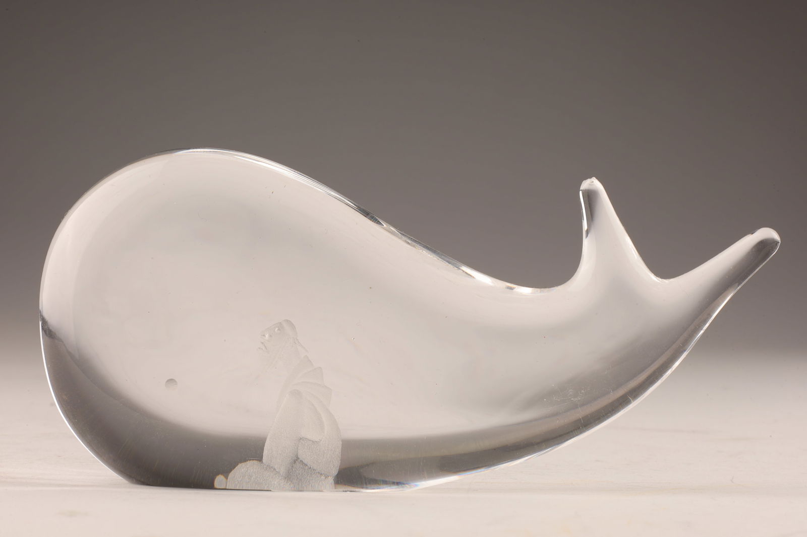 Vicke Lindstrand for Kosta Boda Jonah and Whale: Vicke Lindstrand for Kosta Boda Jonah and the Whale. Small rough spot to tail. Signed on underside. 2.5 inches H x 5.5 L x 1.25 W.