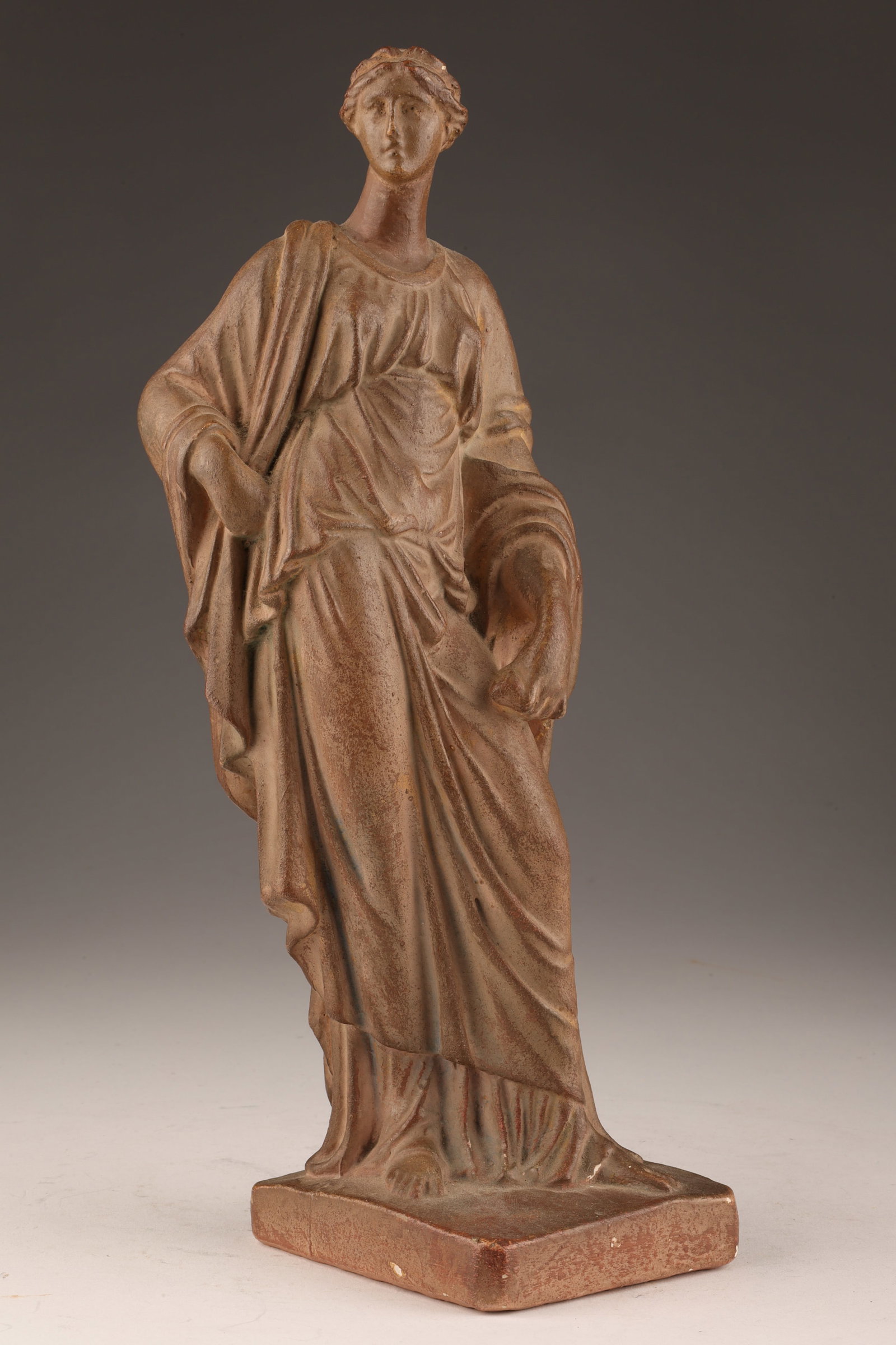 Neoclassical Plaster Sculpture of a Roman Woman: Neoclassical Plaster Sculpture of a Roman Woman. 10 inches H. Some loss to patina on hair, back.