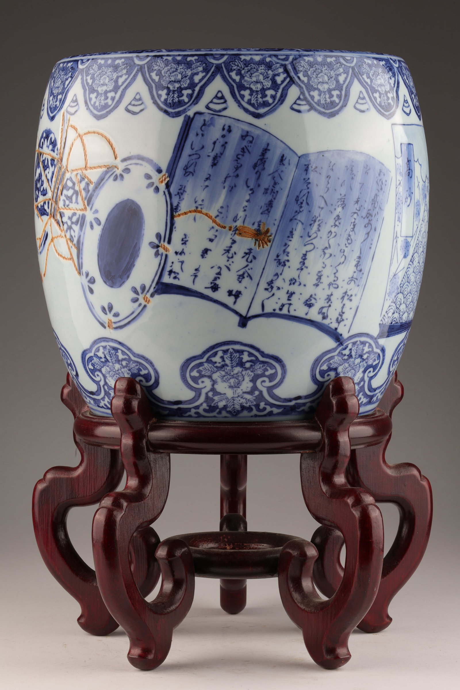 Japanese Blue and White Planter Orange Rope Detail: Japanese Blue and White Cache Pot Planter with Orange Rope Detail on Wood Stand. Pot measures 9 inches H x 9 W, 14.5 inches H with stand.