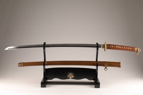 Japanese Imperial WW2 Officer Long Gunto Koshirae: Japanese Imperial WW2 Officer Long Gunto Koshirae with imitation sword made of metal, with metal scabbard. Menuki is sakura (cherry blossom). WW2 period (1939-1945). Sword measures 40 inches L, saya