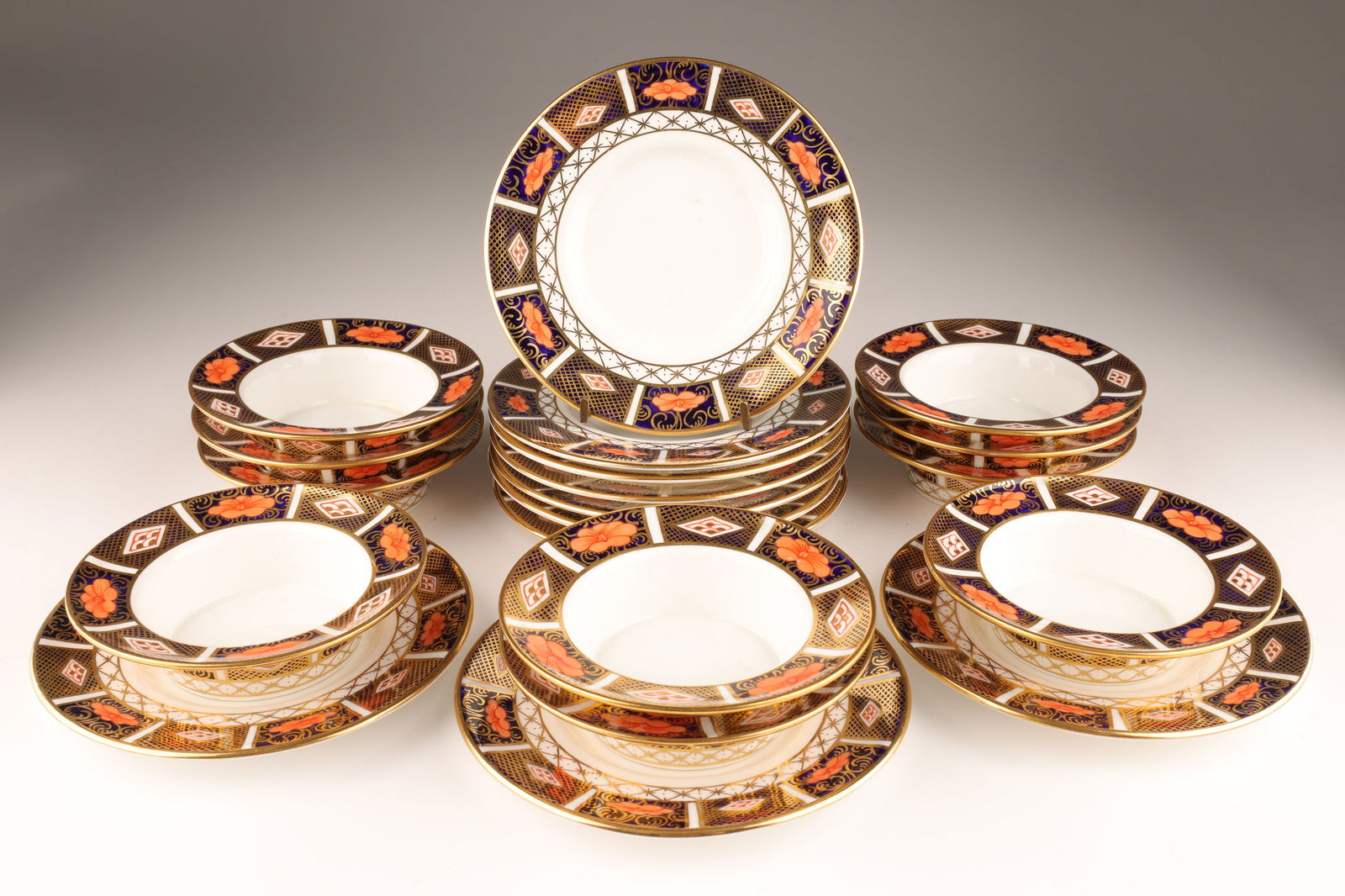 Royal Crown Derby Old Imari 8450 Ramekins 1936: Set of 10 Royal Crown Derby English white bone china ramekins and under plates in the 8450 pattern which compliments the Old Imari pattern, with cobalt blue and orange Imari design with heavy gold ove