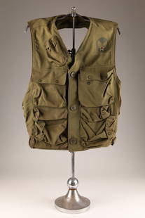 U.S. WWII USAAF Pilot Emergency Sustenance Vest: Original U.S. WWII USAAF Pilot Type C-1 Emergency Sustenance Vest with leather holster. In good condition. Label reads; Vest: Emergency Sustenance Type C-1 Specification No. 3206 Order No. (W33-038) A