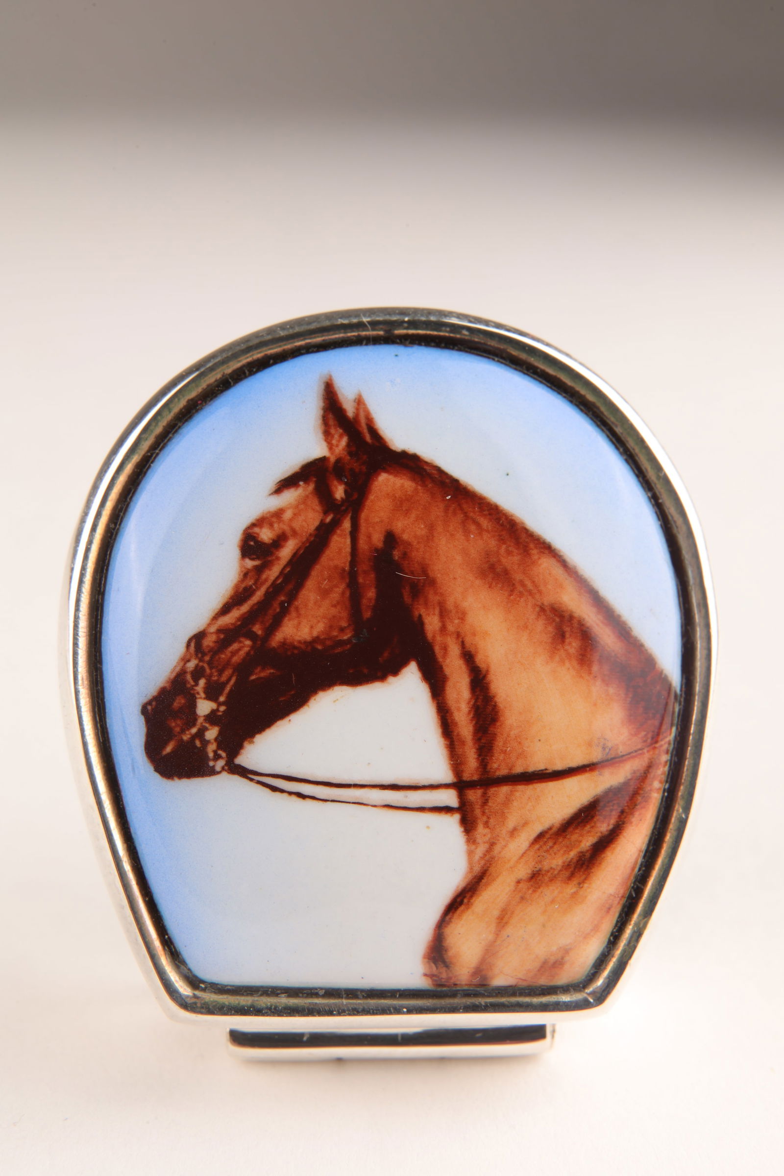 Sterling Painted Porcelain Horse Shoe Pillbox: Sterling Silver and Miniature Painted Porcelain Horse on Horseshoe Shaped Pillbox. Stamped on verso. 1.25 x 1 x 0.5 inches H.