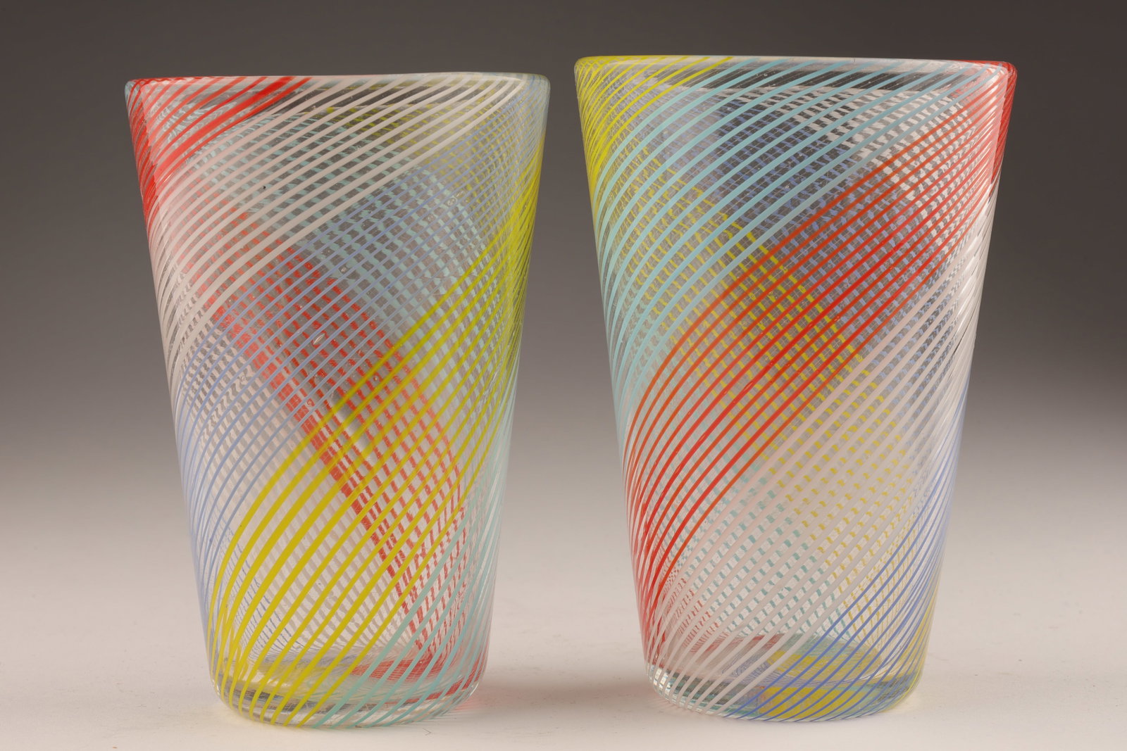 Pair of Vintage Murano Mezza Filigrana Glasses: Pair of Vintage Murano Style Multicoloured Mezza Filigrana Glasses Tumblers. 5 inches H x 3.25 W.