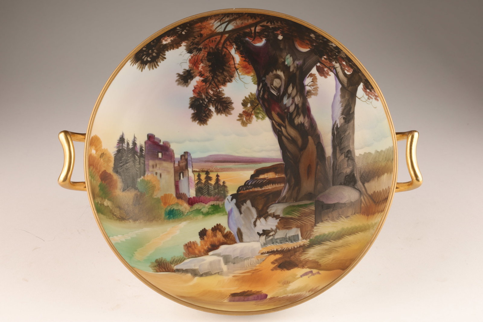 Japanese Painted Porcelain Nippon Landscape Bowl: Japanese Hand-Painted Porcelain Nippon Landscape Bowl with Gilt Handles. 9.75 inches W x 3.5 H.