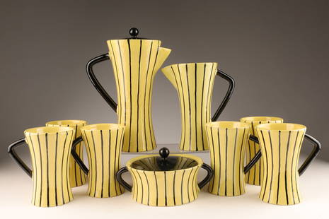 1950s San Polo Otello Rosa Italian Pottery Tea Set: 1950s San Polo Otello Rosa Italian Yellow and Black Pottery Ceramic Tea Coffee Set. Set comprised of 6 cups, one creamer, one sugar bowl and a coffee / tea pot. Coffee Pot measures 9.5 inches H, chip