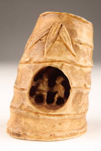 Japanese Carved Signed Netsuke Figures in Bamboo: Japanese Carved Signed Netsuke Miniature Figures in a Section of Bamboo. 1.75 inches H. This item cannot be exported from Canada.