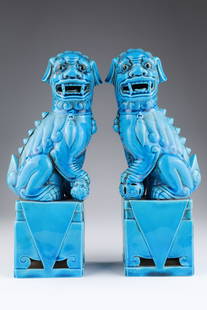 Large Pair Chinese Turquoise Foo Dogs Figurines: Large Pair Of Chinese Turquoise Glaze Foo Dogs Figurines. 12 inches H x 4.5 W x 3 deep.