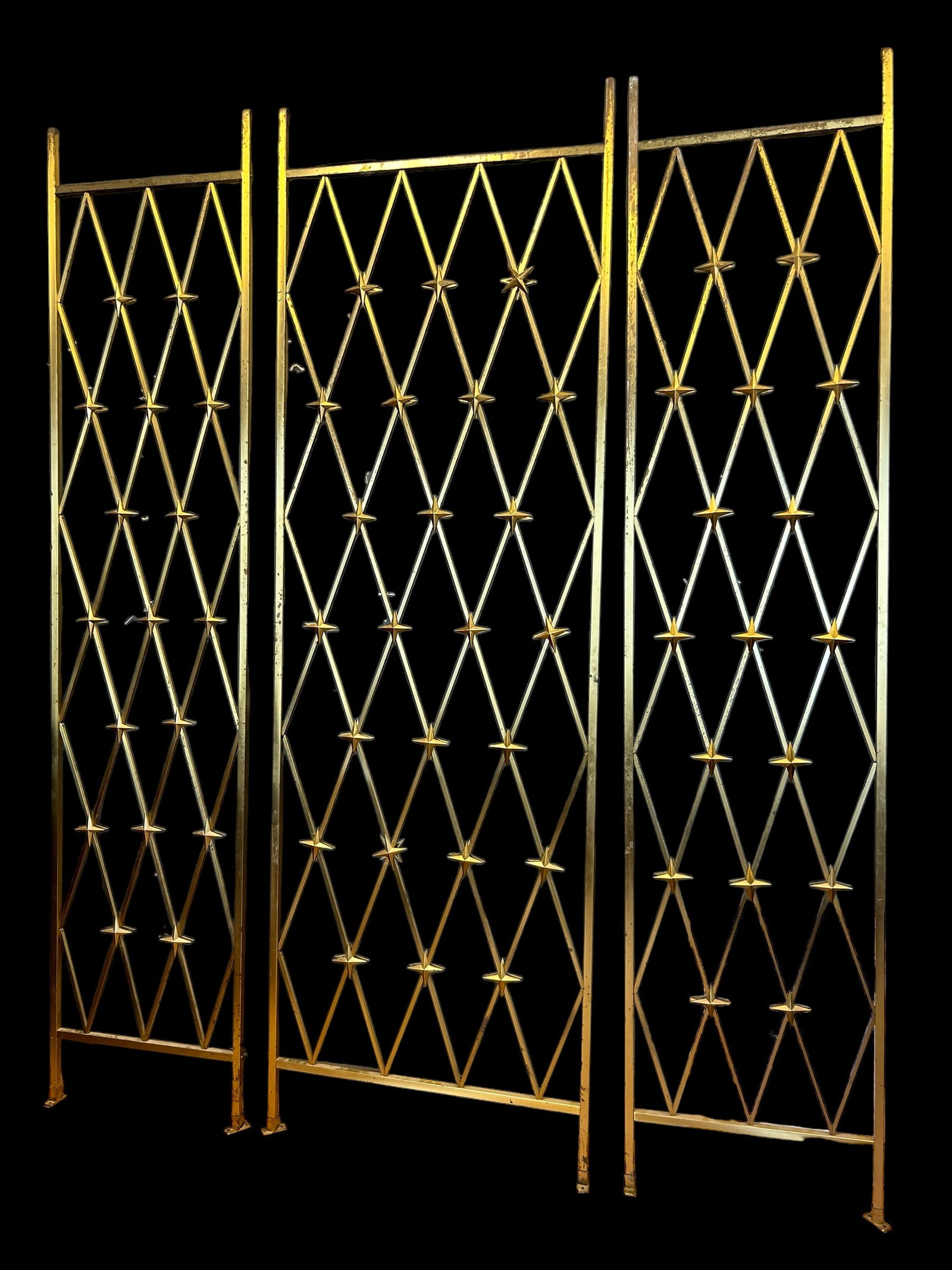Mid Century Modern Brass Starburst Room Dividers: Set of 3 Panels Mid Century Modern Brass Room Dividers. Decorated with 4 pointed stars / starburst. Two panels measure 98 inches H x 22 W, one panel measures 98 x 31.5 inches W.