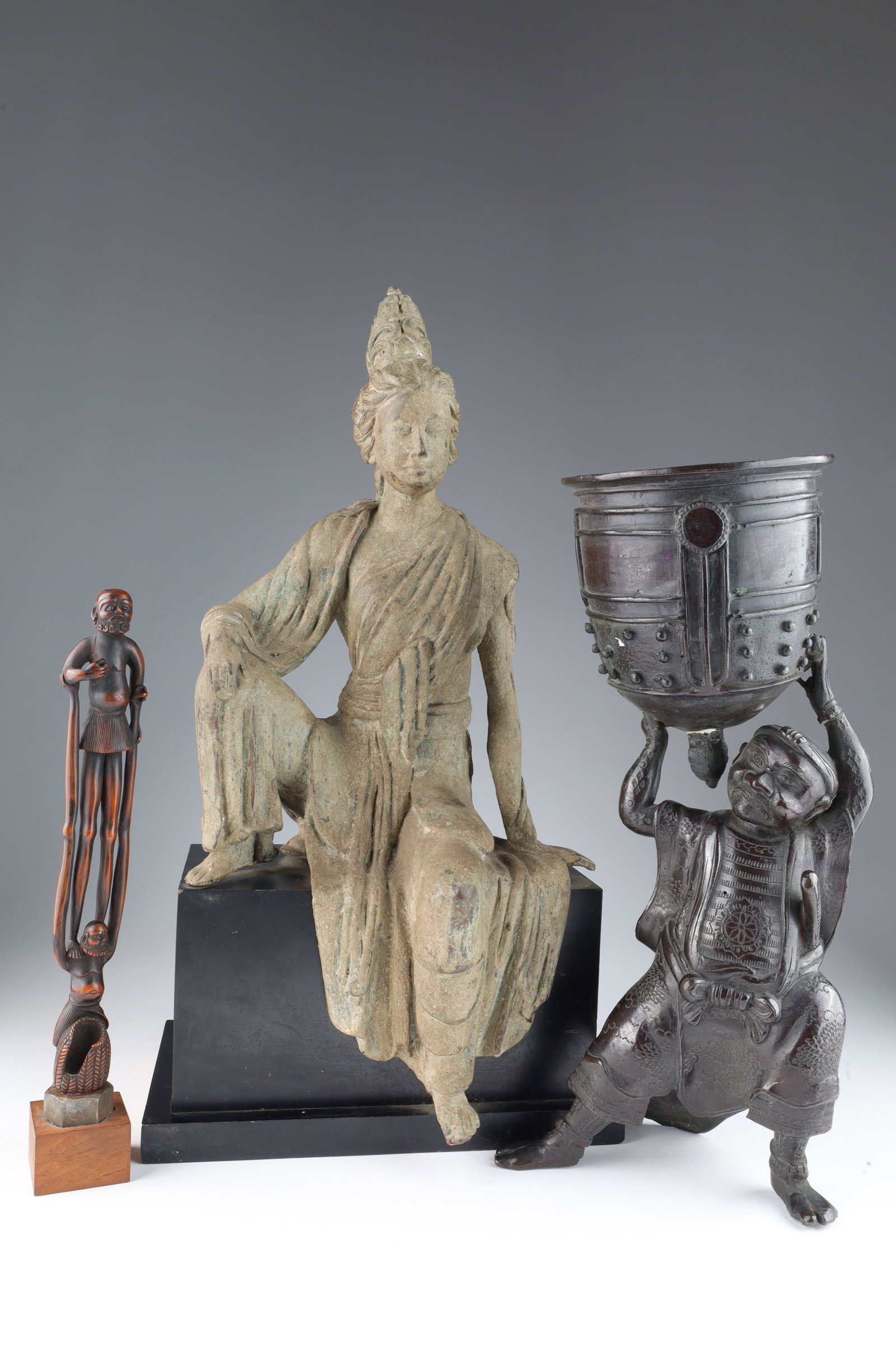 Lot of Antique Chinese Japanese Asian Statues: Lot of Antique Chinese Japanese Asian Statues. Seated Guanyin measures 16 inches H x 8.5 W x 6 deep. Japanese figure with Temple bell measures 13 inches H, some restorations.