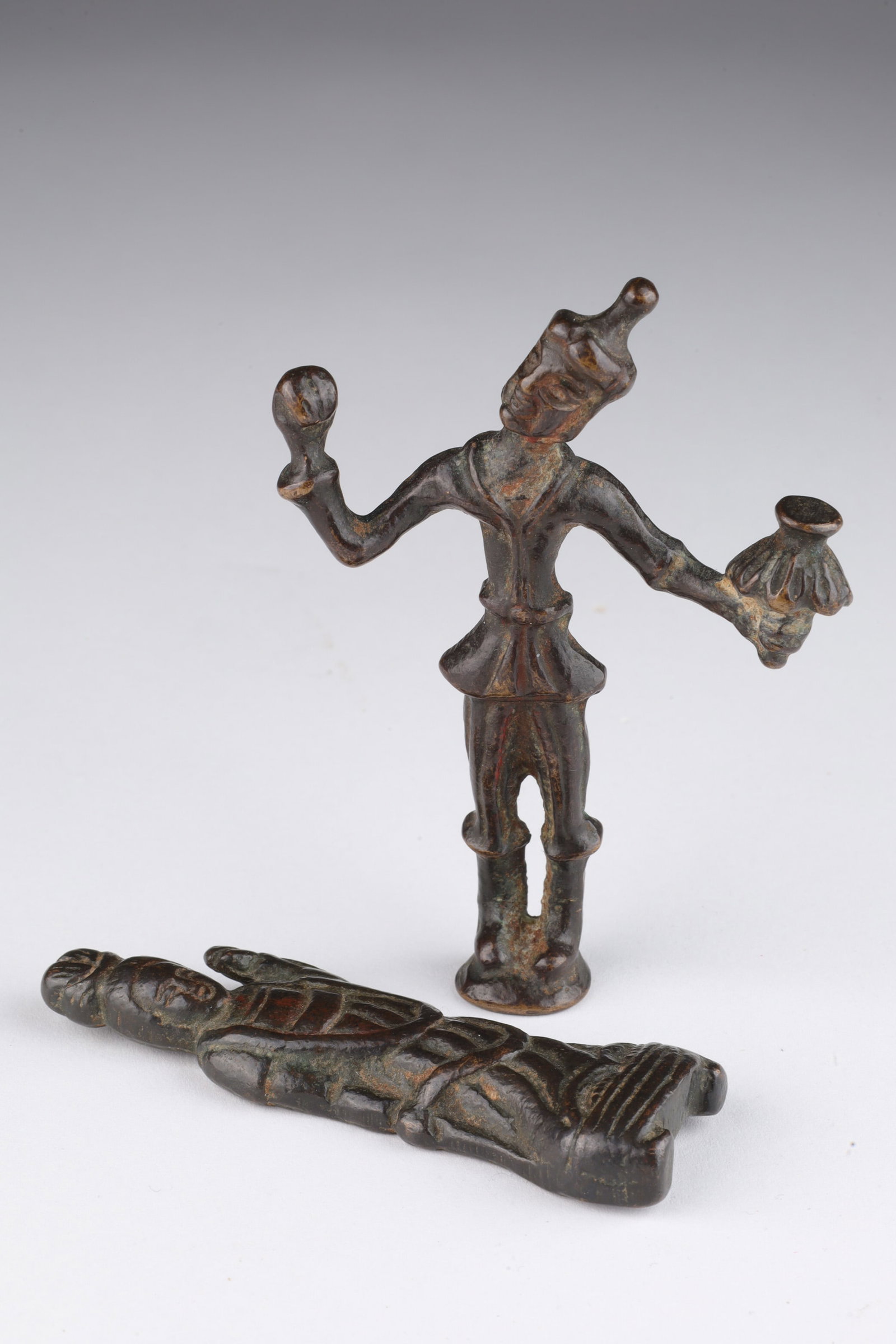 Antique Chinese Bronze Figures: Antique Chinese Bronze Figures. Female guanyin figure signed on back. Male figure with lantern measures 3.5 inches H