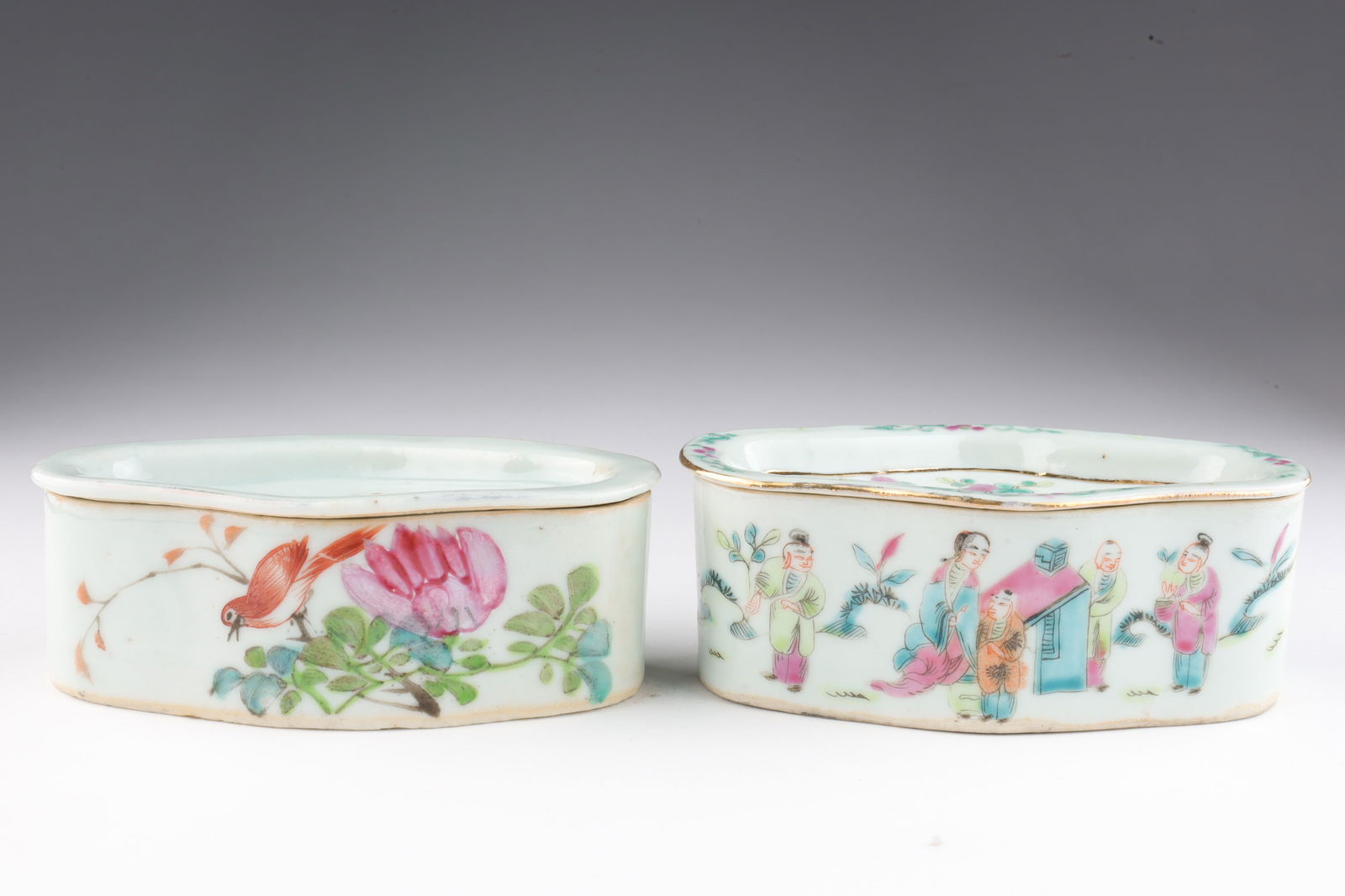 Pair Antique Chinese Hand Painted Cricket Boxes: Pair of Chinese antique white porcelain quatrefoil shaped cricket boxes or cages the lids with punched holes, both with hand painted designs, one with floral and script design, the other with people a